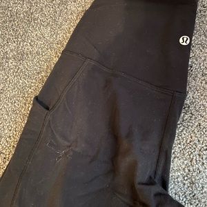 Lululemon Aligns with pockets. Size 6, 28” length.
